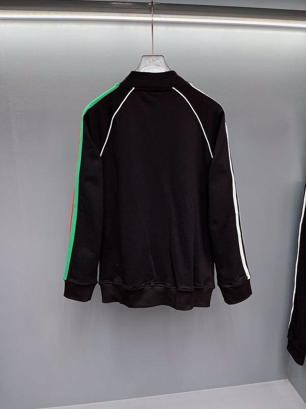 Flat lay presentation of Gucci luxury clothing with logo-detail design