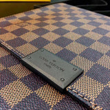 Styled lifestyle shot of polished classic women's handbag – women's luxury handbag