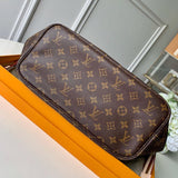 Side profile of polished everyday-luxe women's handbag – women's luxury accessory