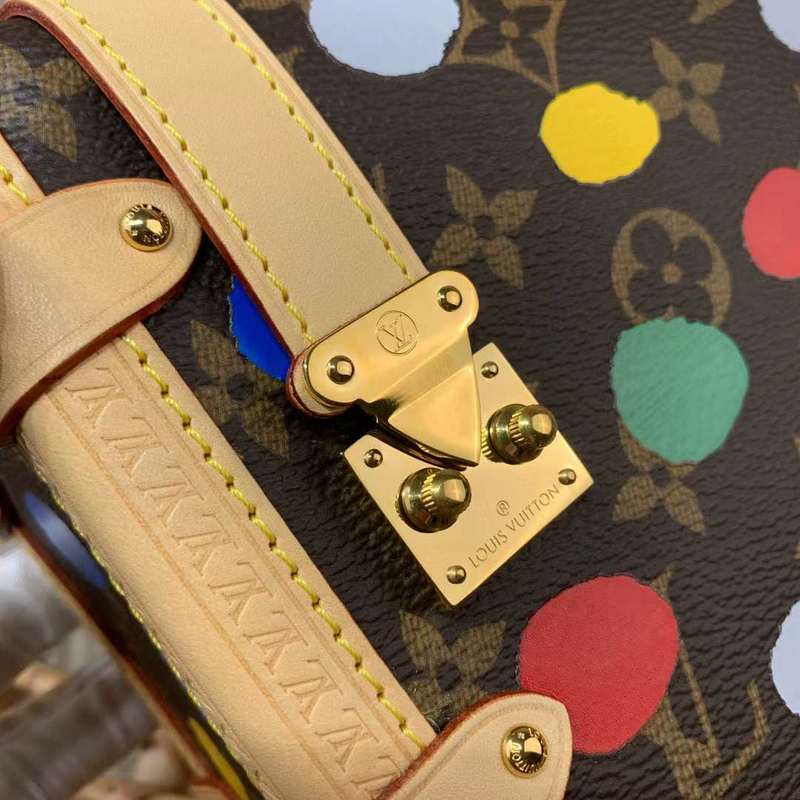 Styled lifestyle shot of structured modern women's handbag – women's luxury handbag