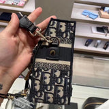 Front view of structured signature women's handbag – women's designer-style accessory