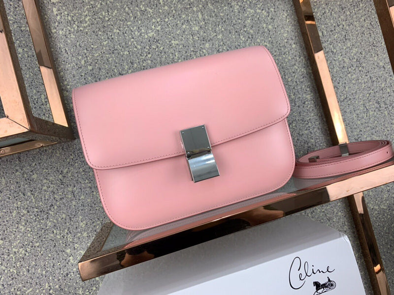 Side profile of modern structured women's handbag – women's statement bag