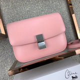 Side profile of modern structured women's handbag – women's statement bag