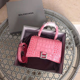 Front view of structured classic women's handbag – women's luxury handbag