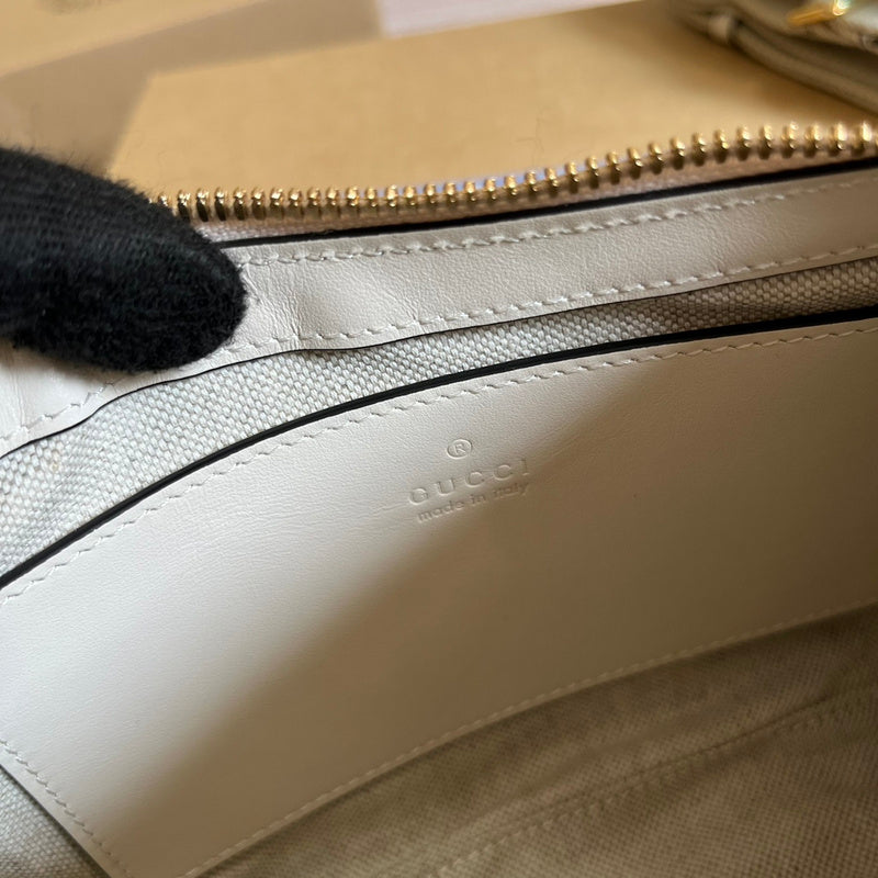 Side view of elegant structured handbag