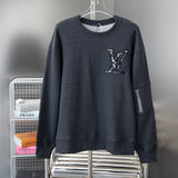 Front view of Louis Vuitton luxury clothing with relaxed-fit cut