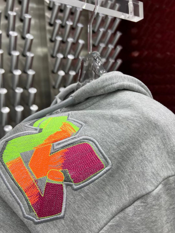 Close-up detail shot of Louis Vuitton luxury clothing with everyday silhouette