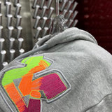 Close-up detail shot of Louis Vuitton luxury clothing with everyday silhouette