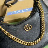 Styled lifestyle shot of polished elevated women's handbag – women's luxury accessory