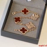 Side view of Van Cleef & Arpels unisex jewelry piece