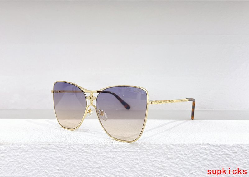 Close-up detail view of Louis Vuitton unisex sunglasses