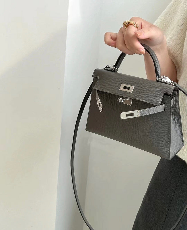 Side view of understated structured handbag