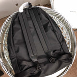 Close-up detail of sleek modern women's handbag – women's statement bag