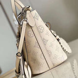 Styled lifestyle shot of structured refined women's handbag – women's everyday handbag