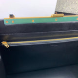 Side profile of sleek elevated women's handbag – women's statement bag