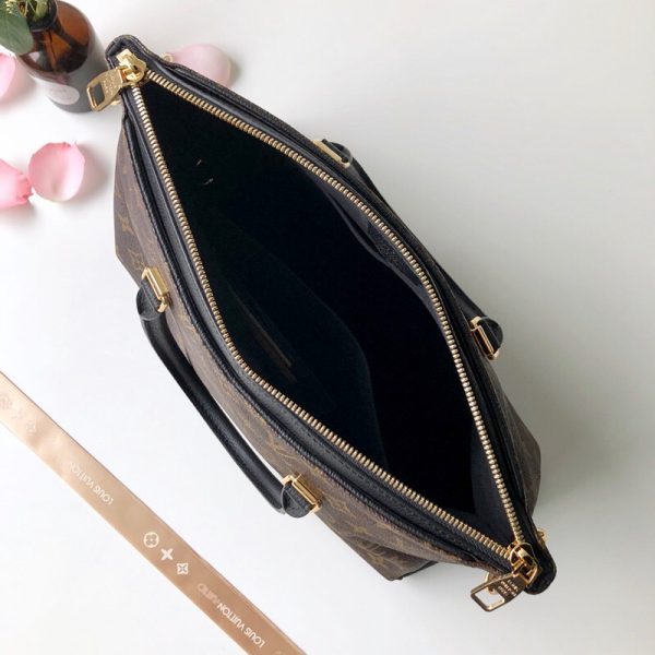Back view of modern statement women's handbag – women's designer-style accessory