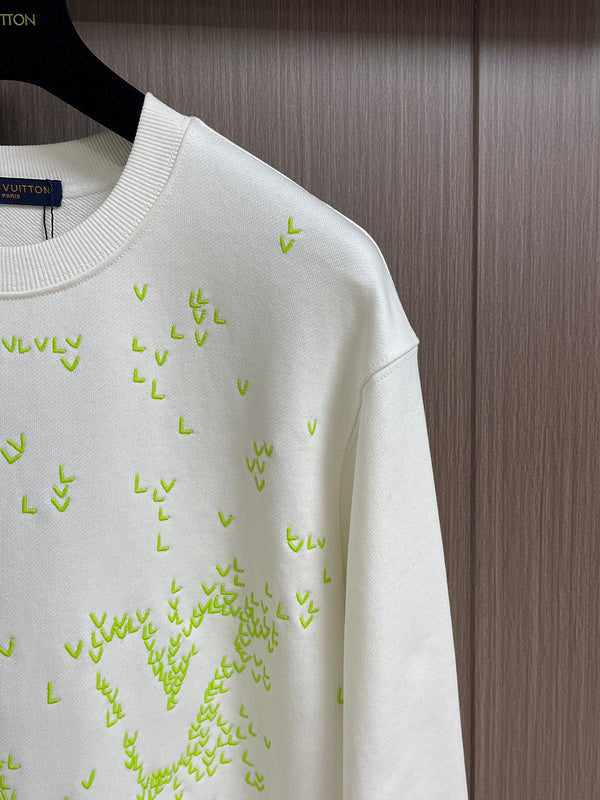 Full styled look of Louis Vuitton luxury clothing with tailored silhouette