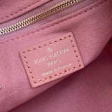 Side profile of refined structured women's handbag – women's statement bag