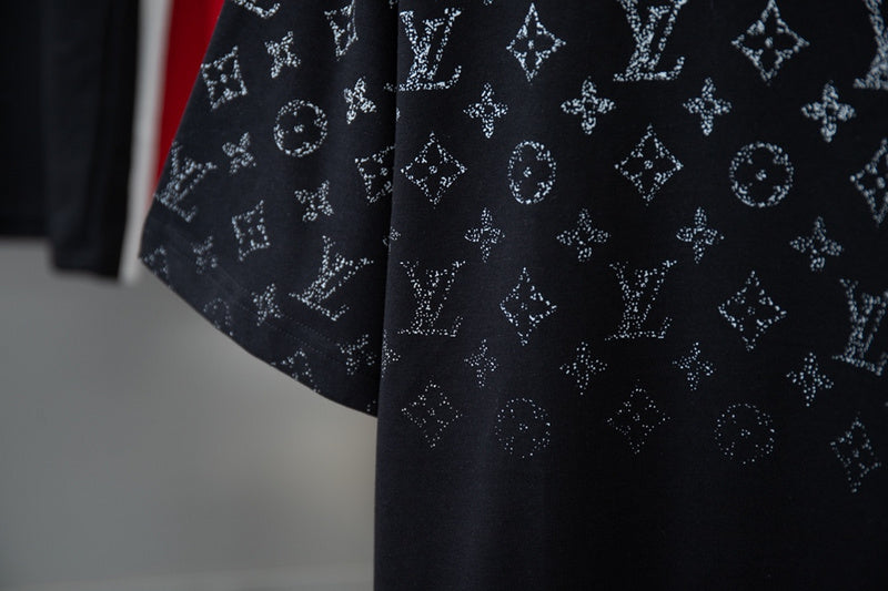Flat lay presentation of Louis Vuitton cotton t-shirt with signature branding