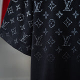 Flat lay presentation of Louis Vuitton cotton t-shirt with signature branding