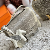  polished shoulder bag styled with outfit