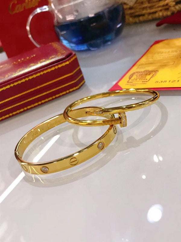 Side view of Cartier unisex jewelry piece