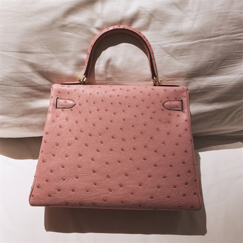Side view of understated structured handbag