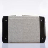 Side view of modern structured handbag