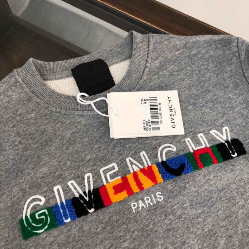 Close-up detail shot of Givenchy luxury clothing with relaxed-fit cut