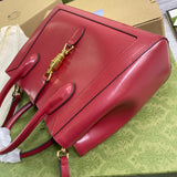 Top view of polished everyday-luxe women's handbag – women's luxury accessory