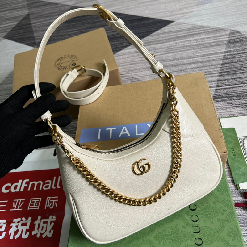 Handle and strap detail of sleek structured women's handbag – women's statement bag