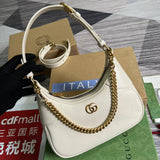 Handle and strap detail of sleek structured women's handbag – women's statement bag