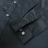 Flat lay presentation of Louis Vuitton luxury clothing with monogram-inspired silhouette