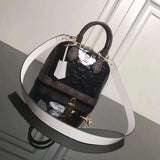 Styled lifestyle shot of everyday-luxe premium women's handbag – women's luxury handbag