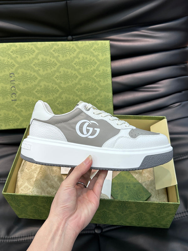Gucci Designer sneakers in bold contrast sleek tonal finish front view