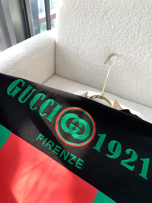 Side profile of Gucci luxury clothing with monogram-inspired silhouette
