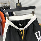 Back view of Rhude luxury clothing with label-forward styling