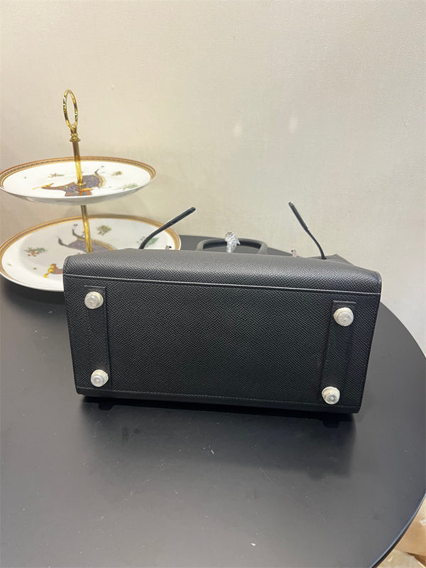Side view of effortless structured handbag