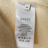 Close-up detail shot of Gucci luxury clothing with tailored silhouette