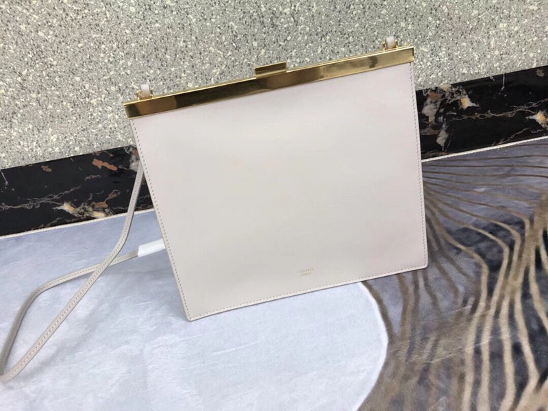 Styled lifestyle shot of refined modern women's handbag – women's luxury handbag