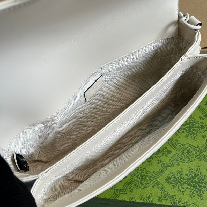 Side profile of premium refined women's handbag – women's luxury handbag