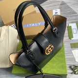 Styled lifestyle shot of classic elevated women's handbag – women's luxury handbag