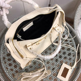 Styled lifestyle shot of polished premium women's handbag – women's statement bag
