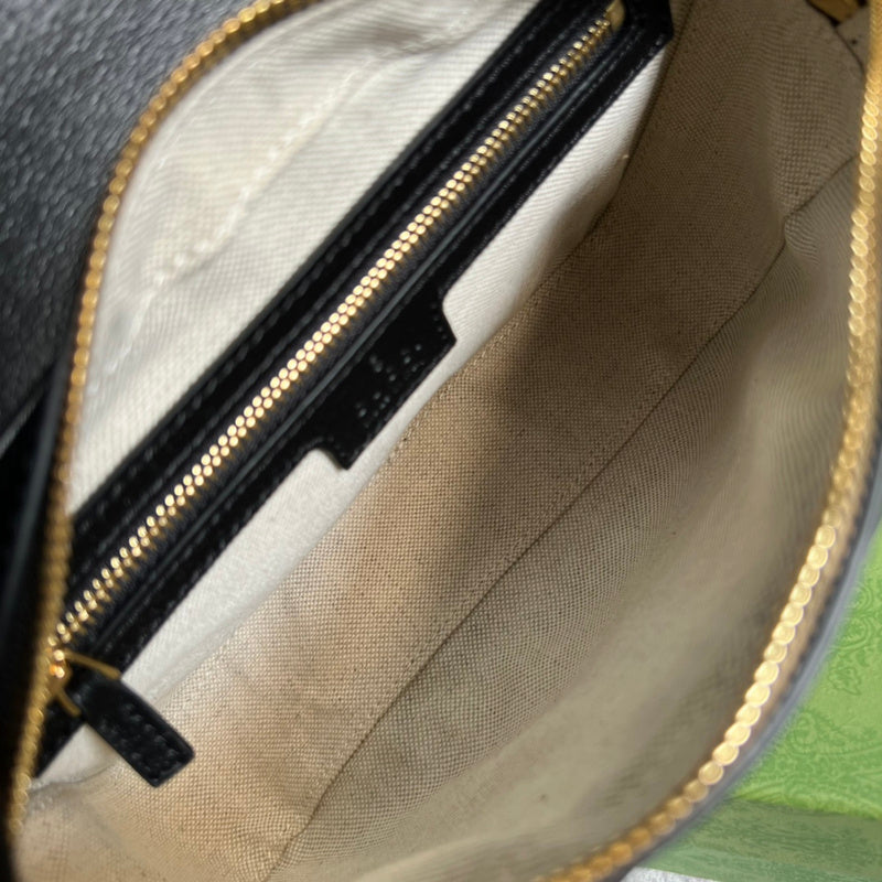 Side view of minimalist structured handbag