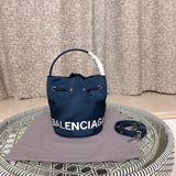 Front view of elevated polished women's handbag – women's luxury handbag