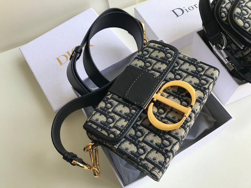 Front view of polished signature women's handbag – women's designer-style accessory