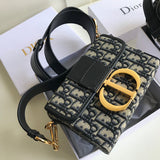 Front view of polished signature women's handbag – women's designer-style accessory