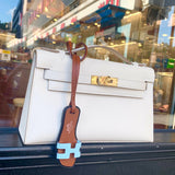 Side view of modern structured handbag