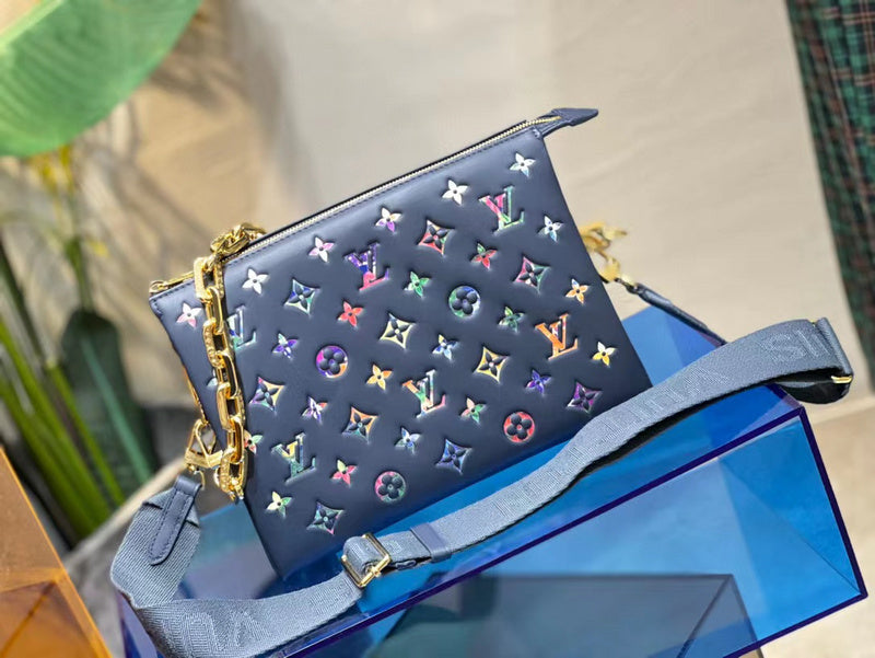 Close-up detail of structured signature women's handbag – women's statement bag