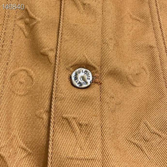 Flat lay presentation of Louis Vuitton luxury clothing with tailored silhouette
